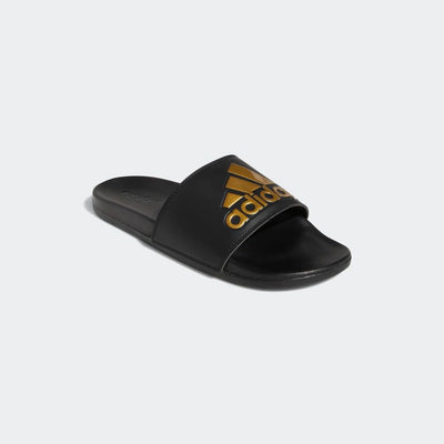 adidas Unisex Adilette Comfort Slide Sandal, Black/Gold Metallic/Black, 13 US Women