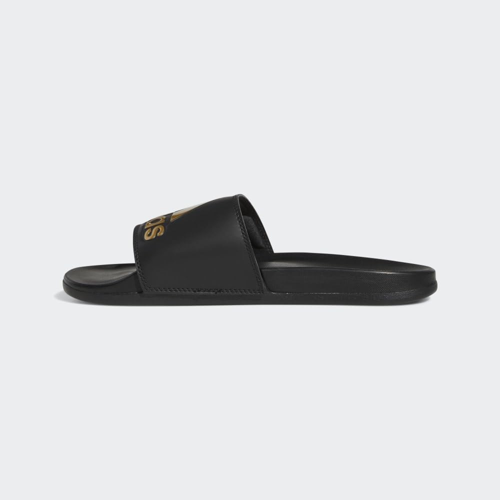 adidas Unisex Adilette Comfort Slide Sandal, Black/Gold Metallic/Black, 13 US Women