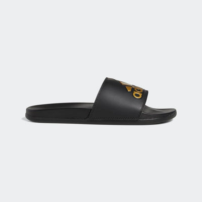 adidas Unisex Adilette Comfort Slide Sandal, Black/Gold Metallic/Black, 13 US Women