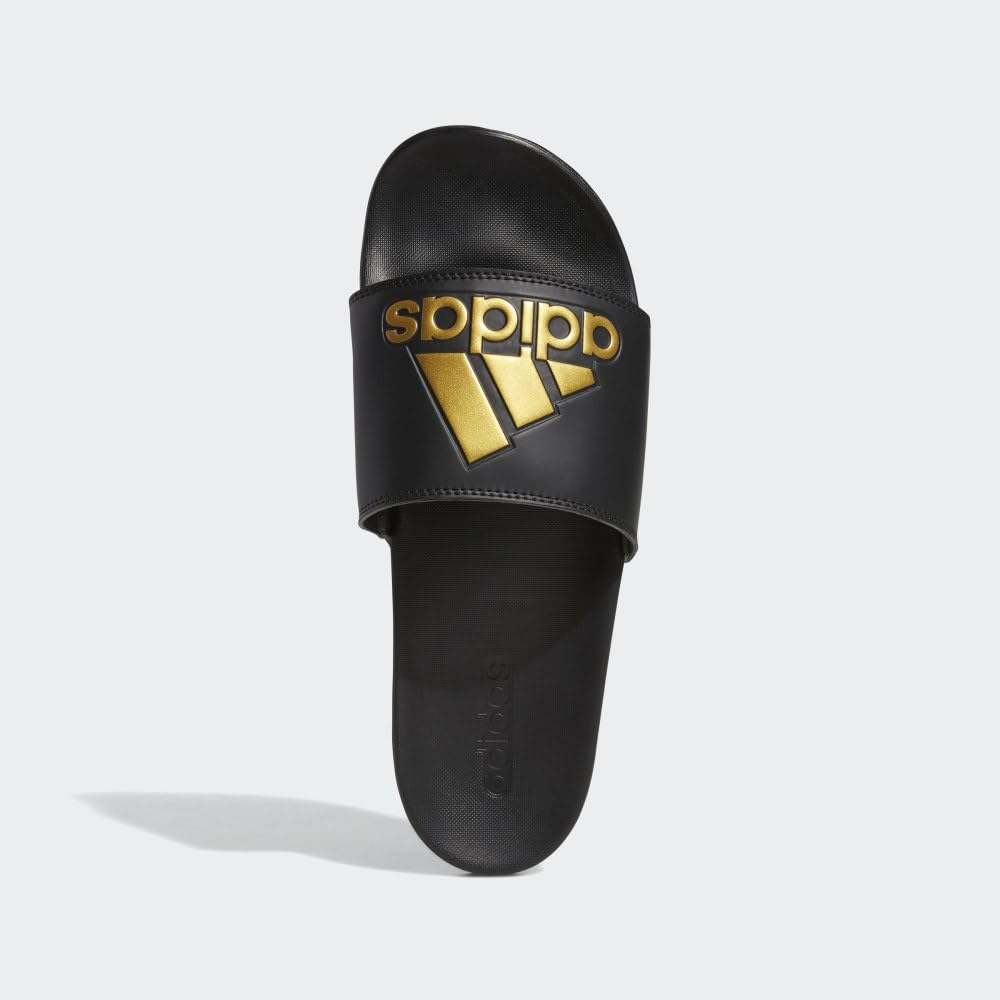 adidas Unisex Adilette Comfort Slide Sandal, Black/Gold Metallic/Black, 13 US Women