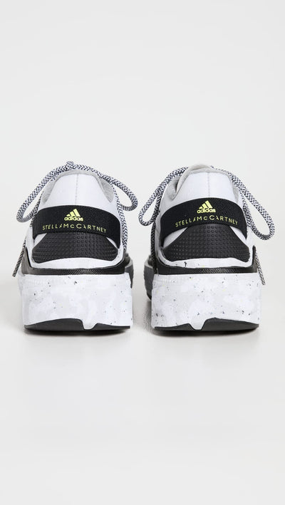 adidas by Stella McCartney Women's Earthlight Sneakers, Ftwwht/Cblack/Syello, White, Black, Grey, 6 Medium US